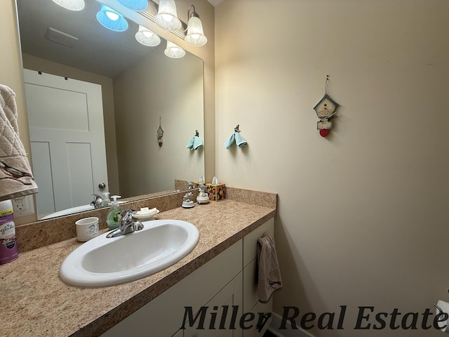 618 Riverwalk St, Hastings, MI 49058 - bathroom featuring vanity