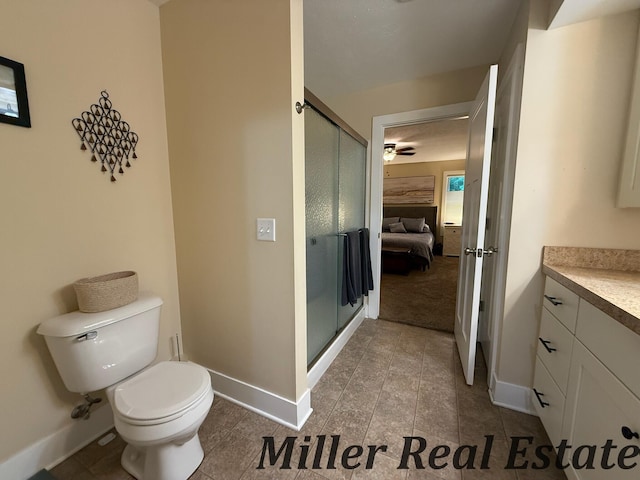 618 Riverwalk St, Hastings, MI 49058 - full bathroom with a shower stall, vanity, tile patterned flooring, connected bathroom, and ceiling fan