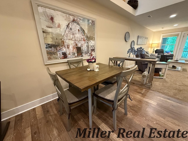 618 Riverwalk St, Hastings, MI 49058 - dining space featuring wood finished floors and recessed lighting