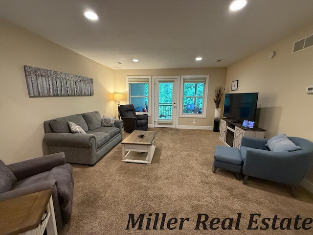 618 Riverwalk St, Hastings, MI 49058 - carpeted living area featuring recessed lighting and baseboards