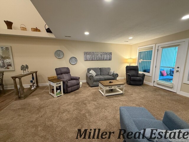 618 Riverwalk St, Hastings, MI 49058 - living room featuring carpet and recessed lighting