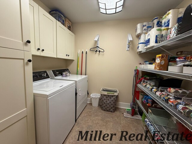 618 Riverwalk St, Hastings, MI 49058 - laundry area featuring independent washer and dryer, cabinet space, and light tile patterned floors