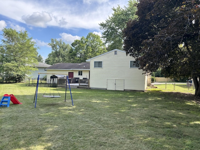 137 Apperson Rd, Battle Creek, MI 49015 - rear view of house with a playground