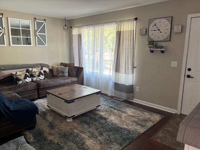 137 Apperson Rd, Battle Creek, MI 49015 - living room with wood finished floors and baseboards