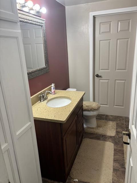 137 Apperson Rd, Battle Creek, MI 49015 - bathroom with vanity and toilet