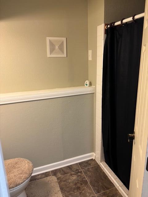 137 Apperson Rd, Battle Creek, MI 49015 - full bathroom with toilet and curtained shower