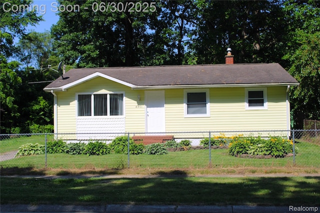 4901 Alpha Way, Flint, MI 48506 - ranch-style house featuring a chimney