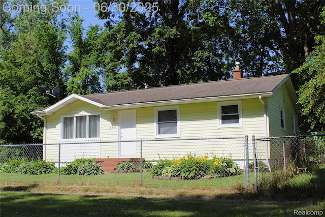 4901 Alpha Way, Flint, MI 48506 - ranch-style home featuring a chimney and a shingled roof