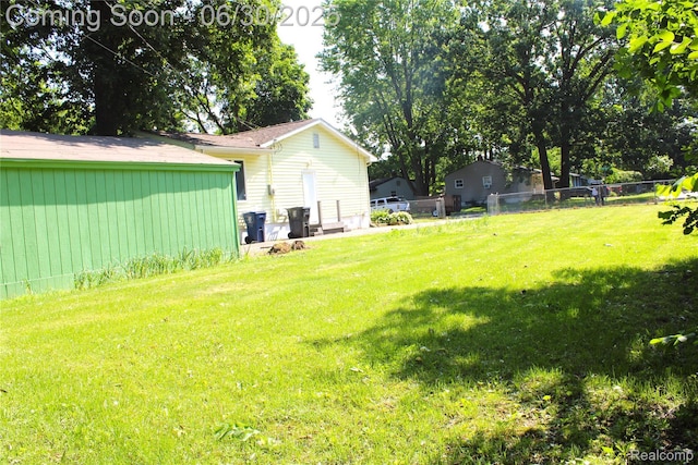 4901 Alpha Way, Flint, MI 48506 - view of yard featuring an outbuilding