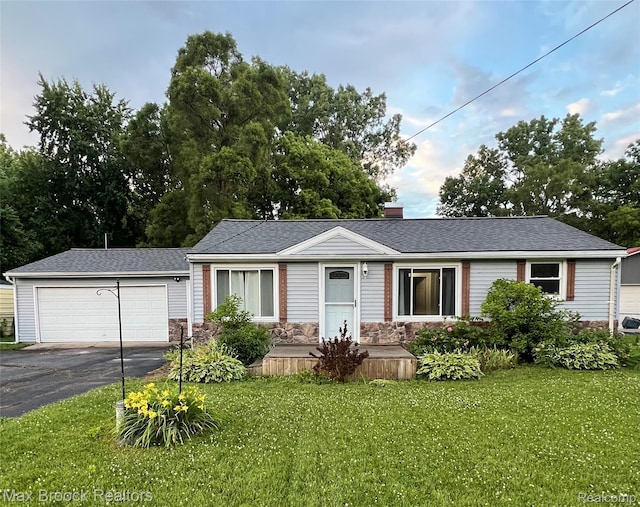 6479 Webb Dr, Flint, MI 48506 - ranch-style home with a front yard, asphalt driveway, a chimney, and stone siding