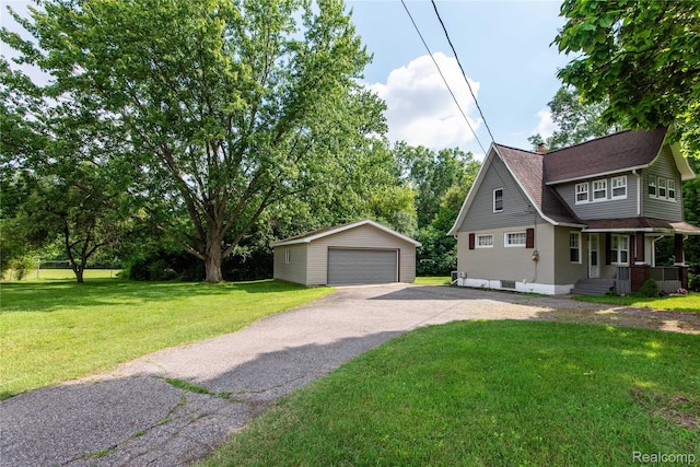 11740 Schram St, Grand Blanc, MI 48439 - view of front of property featuring a detached garage, an outbuilding, roof with shingles, a front lawn, and a chimney
