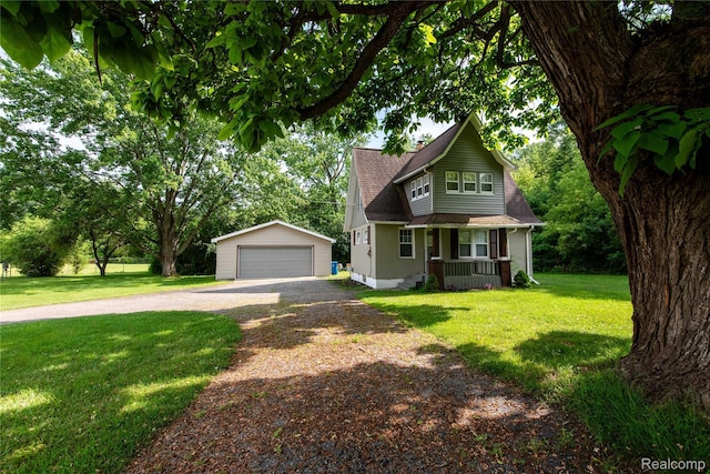 11740 Schram St, Grand Blanc, MI 48439 - view of front facade with an outdoor structure, a garage, a front lawn, roof with shingles, and covered porch
