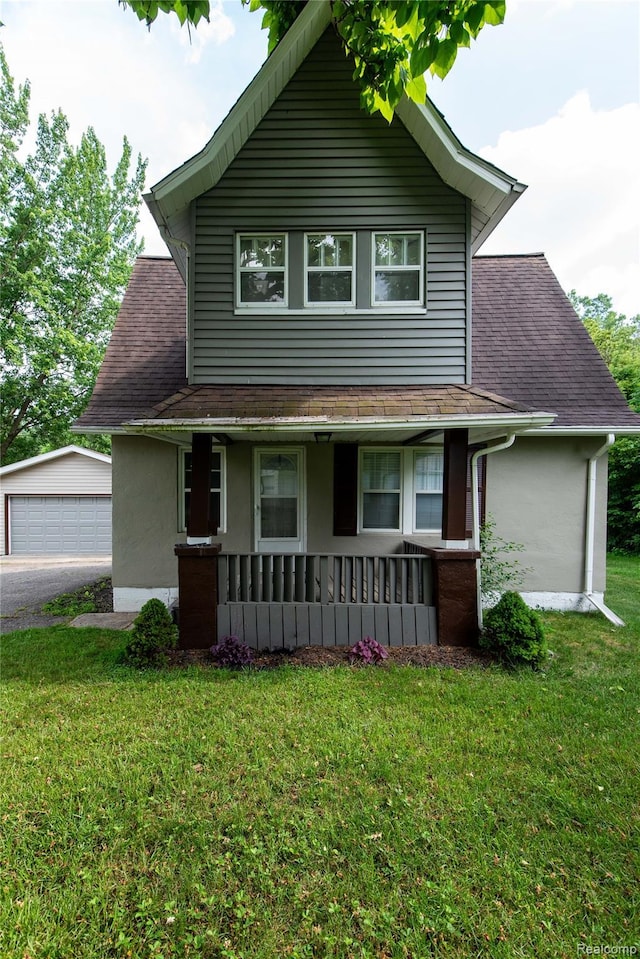 11740 Schram St, Grand Blanc, MI 48439 - view of front of property featuring a porch, an outbuilding, stucco siding, and a shingled roof