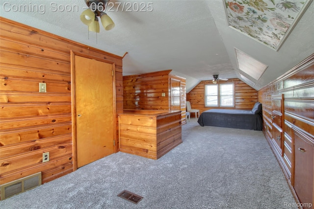2371 Allard Ave, Grosse Pointe Woods, MI 48236 - carpeted bedroom featuring wooden walls, vaulted ceiling, a ceiling fan, and a textured ceiling