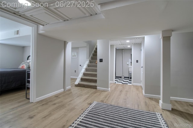 2371 Allard Ave, Grosse Pointe Woods, MI 48236 - finished basement featuring wood finished floors, stairway, and recessed lighting