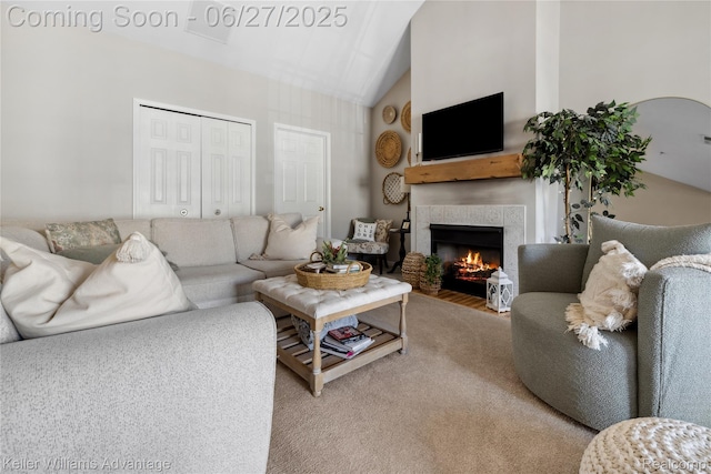 3201 Addington Dr, Commerce Twp, MI 48390 - living room with a fireplace, light carpet, and high vaulted ceiling
