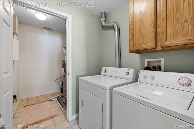 3201 Addington Dr, Commerce Twp, MI 48390 - laundry room with cabinet space, washing machine and clothes dryer, and light flooring