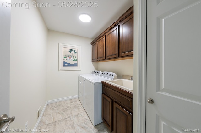 6014 Windemere Ln, Shelby Twp, MI 48316 - laundry area featuring washer and dryer and cabinet space