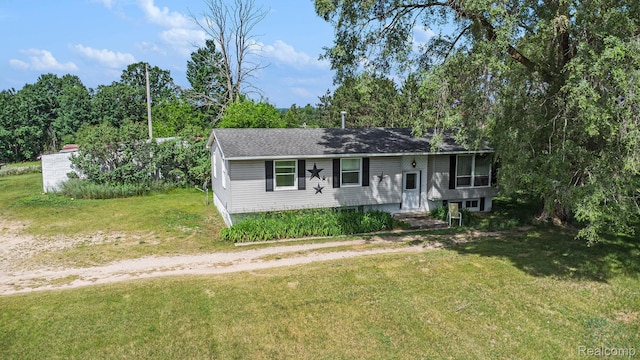 367 N Morrison Rd, West Branch, MI 48661 - view of front of property featuring a front lawn and roof with shingles