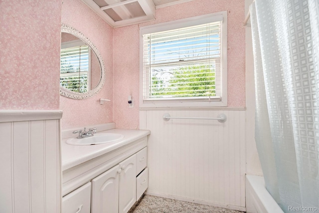 367 N Morrison Rd, West Branch, MI 48661 - full bathroom with vanity, a wainscoted wall, plenty of natural light, shower / bathtub combination with curtain, and wallpapered walls