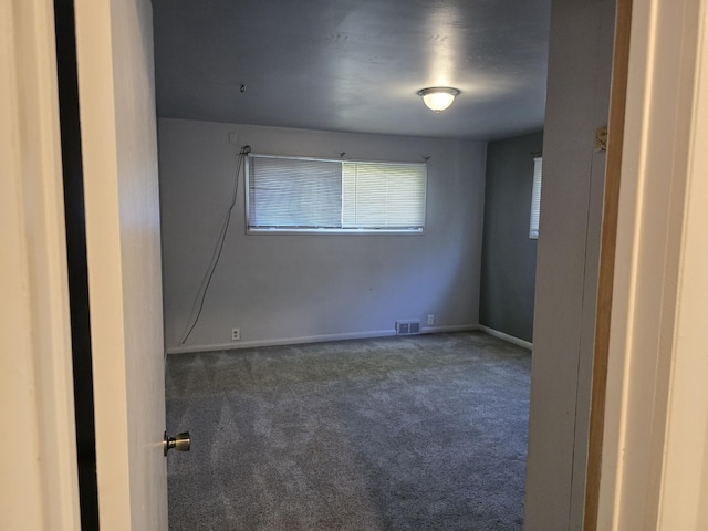 9361 W Parkway St, Detroit, MI 48239 - carpeted empty room with baseboards