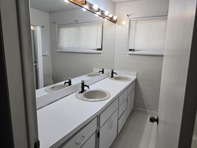 9361 W Parkway St, Detroit, MI 48239 - full bath featuring tile walls, tile patterned floors, and double vanity