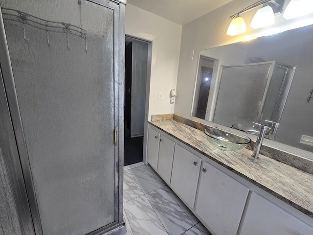 9361 W Parkway St, Detroit, MI 48239 - full bathroom featuring marble finish floors, a stall shower, and vanity