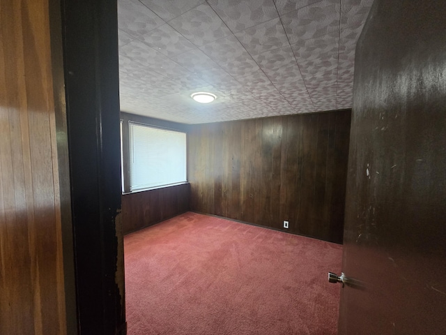 9361 W Parkway St, Detroit, MI 48239 - carpeted spare room featuring wood walls