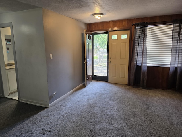 9361 W Parkway St, Detroit, MI 48239 - carpeted entrance foyer with a textured ceiling and baseboards