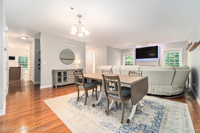293 S Village Way, Canton, MI 48188 - dining area featuring wood finished floors and a chandelier