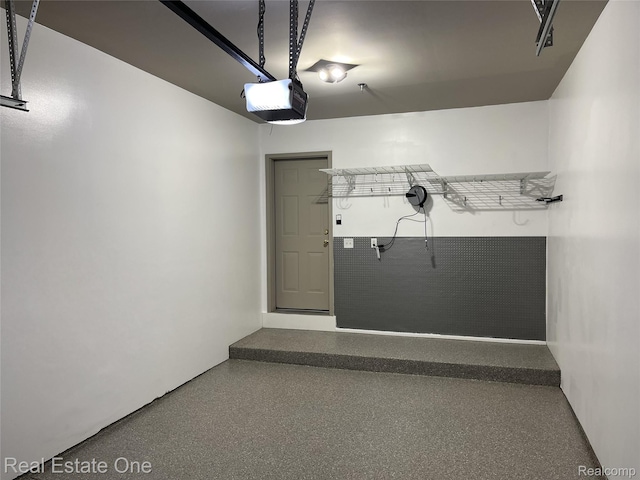 293 S Village Way, Canton, MI 48188 - garage featuring a garage door opener