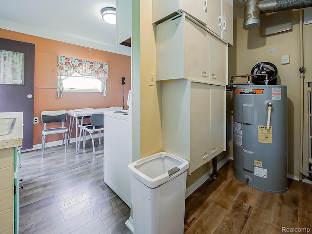 241 W Ann Arbor Ave, Pontiac, MI 48340 - utility room featuring electric water heater, heating unit, and washer and dryer