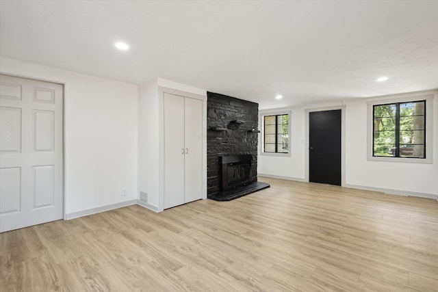 3736 Michael Ave SW, Wyoming, MI 49509 - unfurnished living room featuring light wood finished floors and recessed lighting