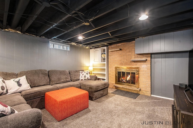 1538 10th St NW, Grand Rapids, MI 49504 - carpeted living room with a brick fireplace