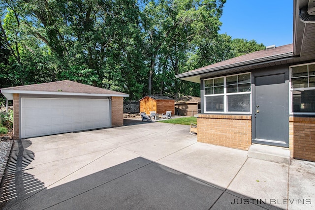 1538 10th St NW, Grand Rapids, MI 49504 - detached garage featuring a shed