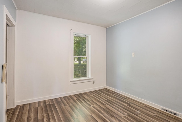 204 W Clay St, Sherwood, MI 49089 - unfurnished room with dark wood-style floors and crown molding