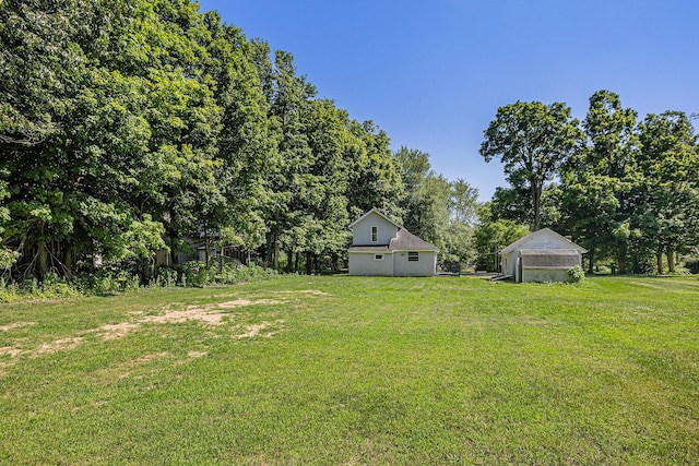204 W Clay St, Sherwood, MI 49089 - view of green lawn featuring an outbuilding
