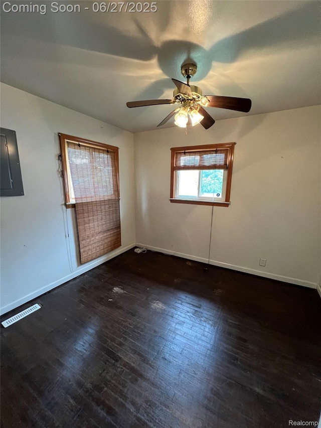 6832 Cornell St, Taylor, MI 48180 - unfurnished room featuring electric panel, a ceiling fan, and wood finished floors