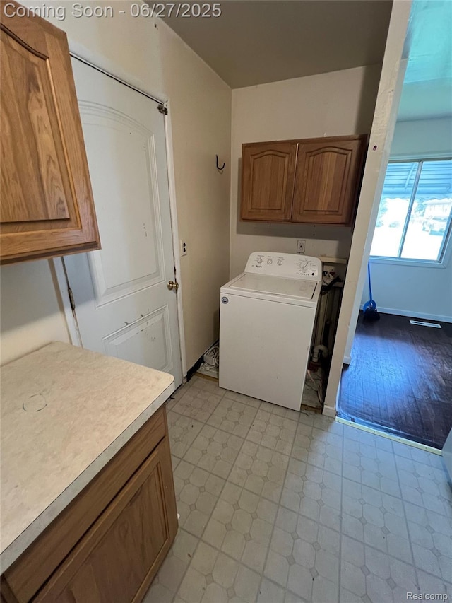 6832 Cornell St, Taylor, MI 48180 - washroom with washer / dryer and cabinet space