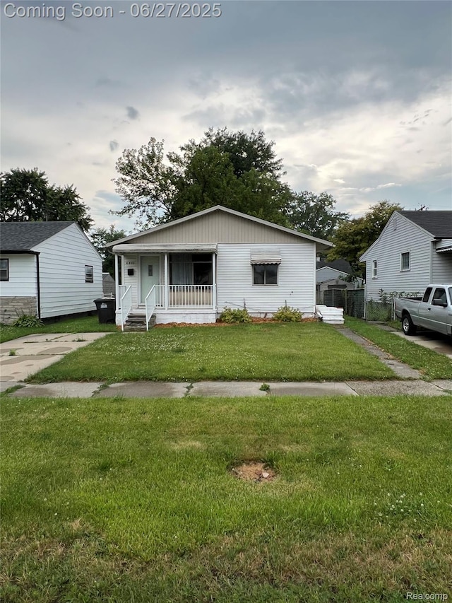 6832 Cornell St, Taylor, MI 48180 - bungalow-style house featuring a porch and a front lawn