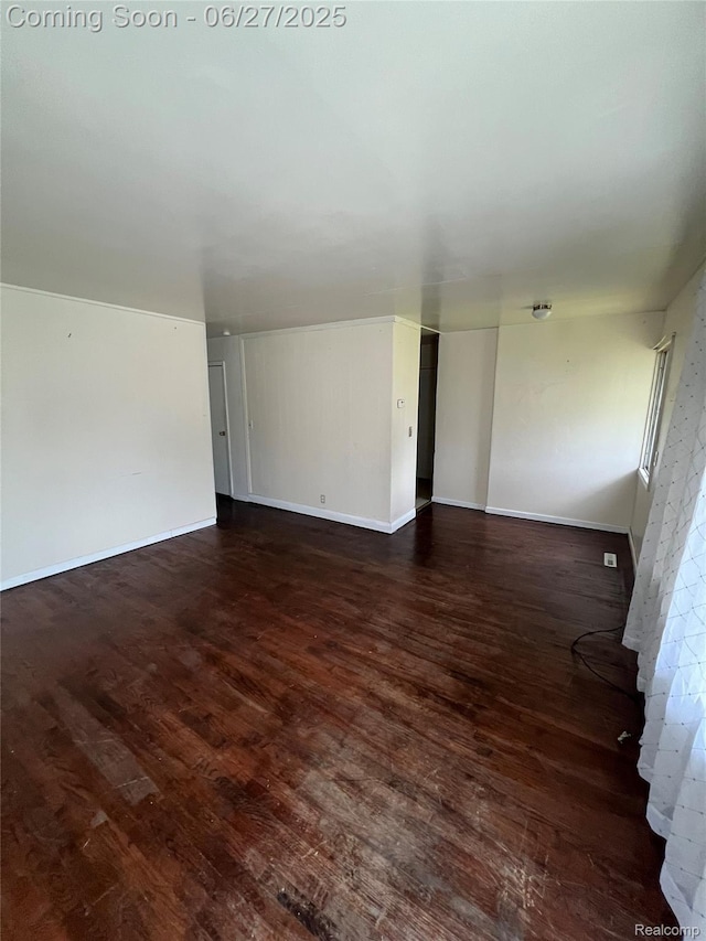 6832 Cornell St, Taylor, MI 48180 - spare room with dark wood-type flooring and baseboards