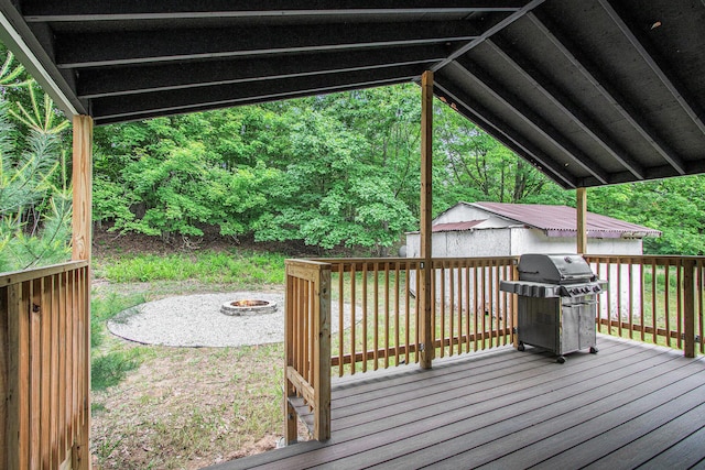80150 46th Ave, Coloma, MI 49038 - deck featuring a fire pit and a grill