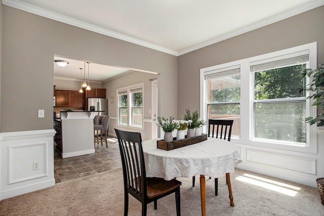 6061 Equestrian Woods Ct, Kalamazoo, MI 49009 - carpeted dining room featuring ornamental molding