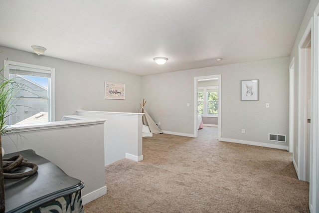 6061 Equestrian Woods Ct, Kalamazoo, MI 49009 - empty room featuring carpet and baseboards