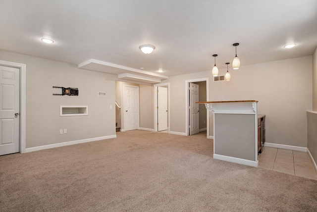 6061 Equestrian Woods Ct, Kalamazoo, MI 49009 - unfurnished living room featuring light colored carpet and recessed lighting