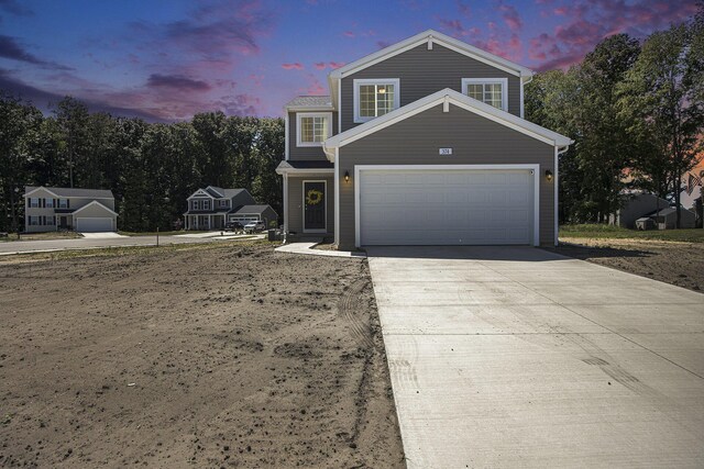 374 Lotz Ct, Wayland, MI 49348 - traditional-style house with driveway