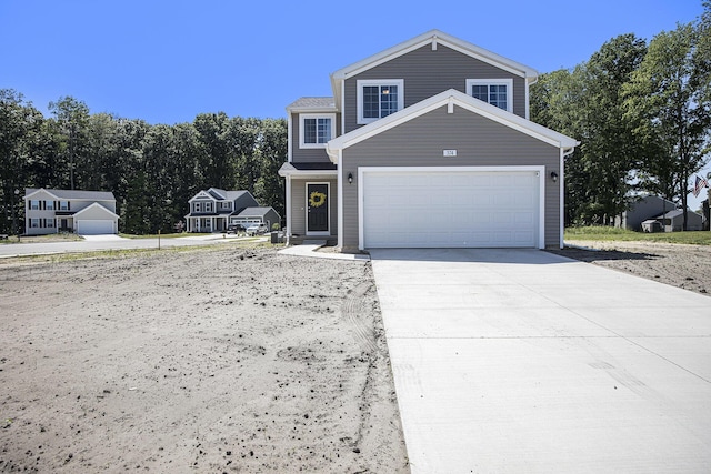 374 Lotz Ct, Wayland, MI 49348 - traditional-style home featuring concrete driveway