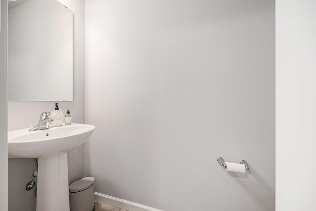 374 Lotz Ct, Wayland, MI 49348 - bathroom featuring baseboards