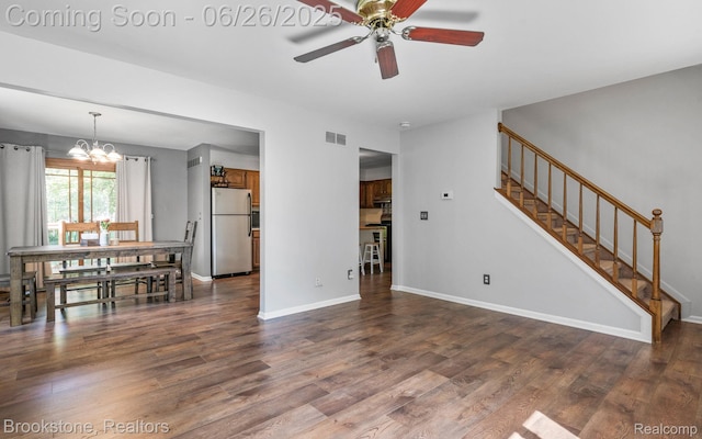 646 Alan Dr, Lake Orion, MI 48362 - living area with a chandelier, dark wood-style floors, a ceiling fan, and stairs
