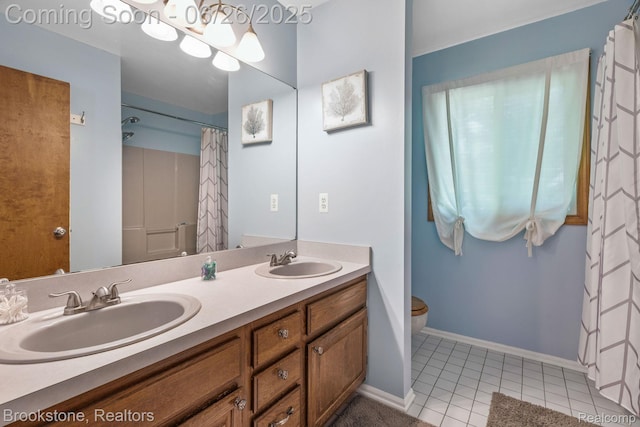 646 Alan Dr, Lake Orion, MI 48362 - bathroom with tile patterned floors and double vanity